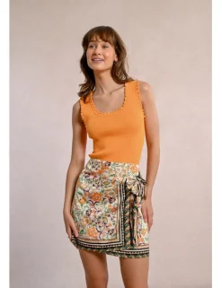 Falda corta con estampado y lazada