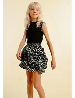Falda corta con estampado y volantes