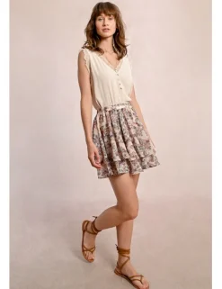 Falda corta con estampado y volantes