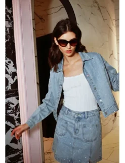 Falda corta vaquera estampado lunares