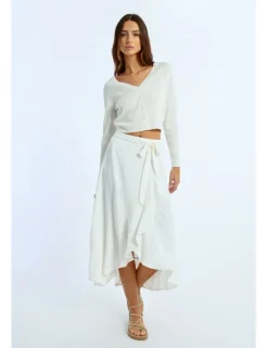 Falda midi asimétrica con volante y lazada