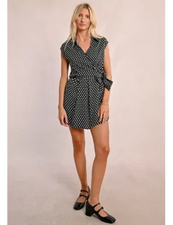 Mono corto con lazada y lunares