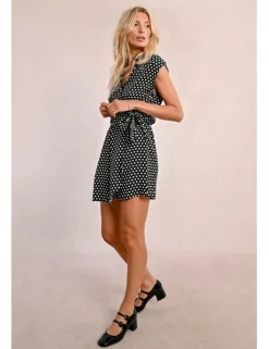 Mono corto con lazada y lunares