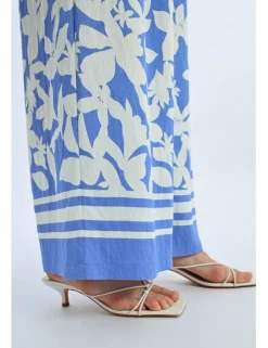 Pantalón largo amplio con estampado floral