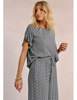 Pantalón largo con estampado y lazada