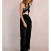 Pantalón largo con lazada y pliegues