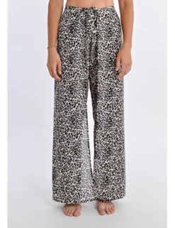 Pantalón largo con lazada y estampado