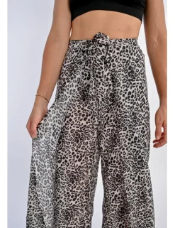 Pantalón largo con lazada y estampado