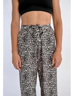 Pantalón largo con lazada y estampado