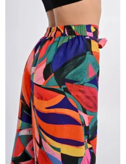 Pantalón largo con lazada y estampado