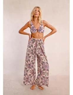 Pantalón largo con lazada y estampado