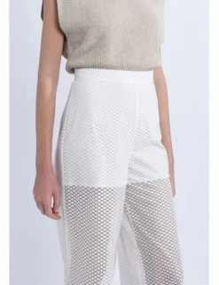 Pantalón largo en tejido bordado y transparencias