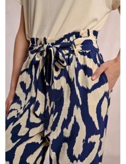 Pantalón tobillero con estampado y lazada