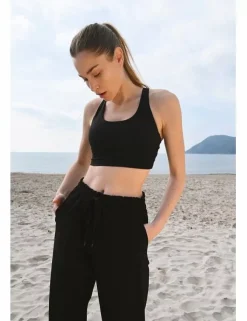 Pantalón tobillero, deportivo, con lazada