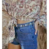 Short vaquero detalle flores