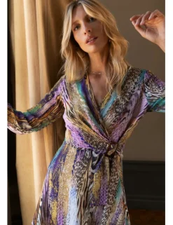 Vestido corto de manga larga con estampado y lazada