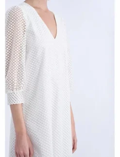 Vestido corto de manga larga en tejido bordado