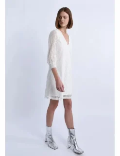 Vestido corto de manga larga en tejido bordado