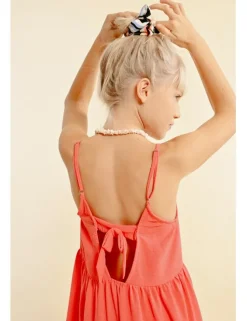 Vestido de tirantes volantes y lazada