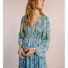 Vestido largo con estampado y volantes