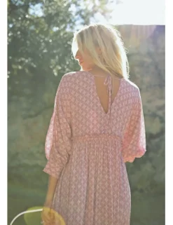 Vestido largo con estampado y lazada
