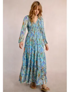 Vestido largo con estampado y volantes