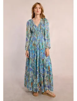 Vestido largo con estampado y volantes