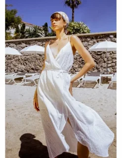 Vestido largo cruzado con bajo asimétrico