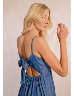 Vestido largo efecto vaquero con abertura y volantes