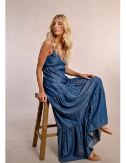 Vestido largo efecto vaquero con abertura y volantes
