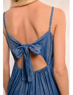 Vestido largo efecto vaquero con abertura y volantes