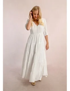 Vestido largo en tejido bordado con volantes