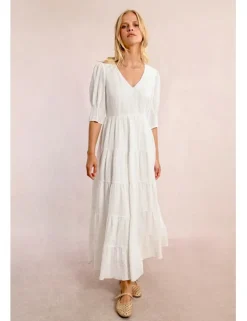Vestido largo en tejido bordado con volantes